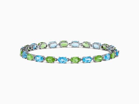 14K White Gold Blue Topaz and Peridot Tennis Bracelet, 13.80 TCW For Sale